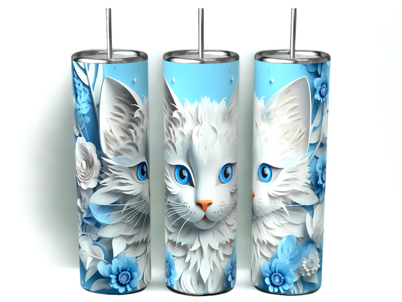 Edelstahl-Tumbler 590 ml mit weißer Katze und blauen Blumen, doppelwandig isoliert, inklusive Deckel und Edelstahl-Strohhalm. Hält Getränke 12 Stunden kalt oder 6 Stunden heiß. Hochwertig sublimiert, langlebig und wiederverwendbar. Perfektes Geschenk für Katzenliebhaber und Tierfreunde.