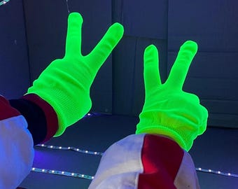 Guantes de punto con luz ultravioleta negra: actuación en fiesta rave de neón