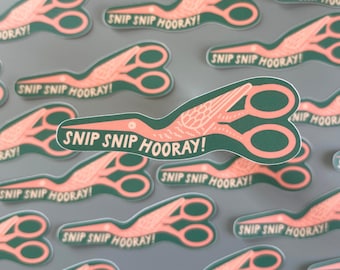 May include: A selection of stickers depicting scissors with a bird design in coral and green. Each sticker has the text "SNIP SNIP HOORAY!" in white. The stickers are displayed on a grey background.