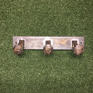 Railroad spike coat/hat rack