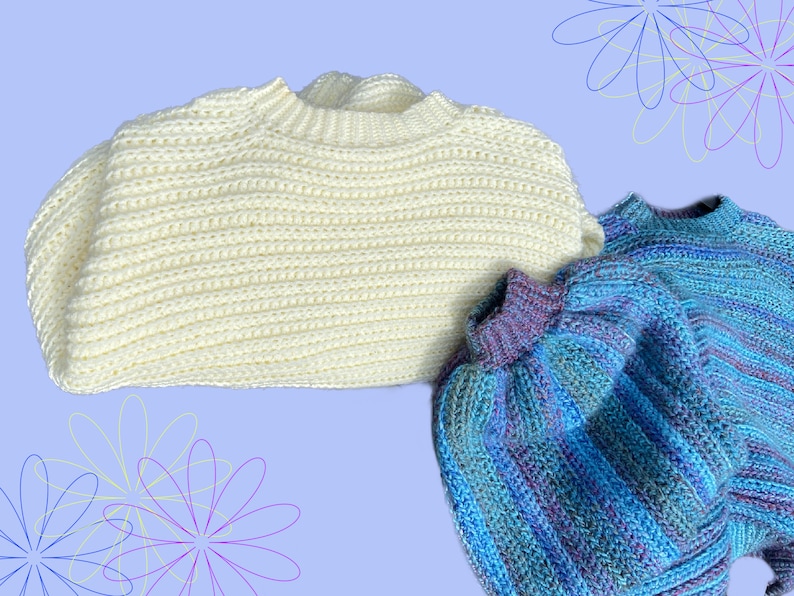 May include: Three handmade crochet sweaters in the image. One is a cream color, and the other two are blue with purple and teal stripes. The sweaters have a ribbed texture and a crew neck design. The background is a light purple with flower outlines.