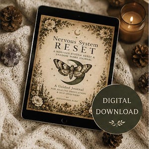 May include: A digital download of a journal titled "Nervous System RESET" with a moth and moon graphic. The journal is displayed on a tablet, surrounded by decorative elements like pinecones, a candle, and a crystal. A green circle with the words "DIGITAL DOWNLOAD" is also present.