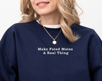 May include: Navy blue sweatshirt with the text "Make Fated Mates A Real Thing" in white.