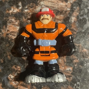 Boneco de ação Mini Rescue Heroes da Fisher Price 2004, bombeiro, laranja neon