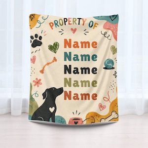 May include: A cream-colored blanket featuring the text PROPERTY OF followed by five lines of the word Name in various colors. The design includes a black dog, paw prints, hearts, a ball, a bone, and abstract shapes in orange, green, and blue.