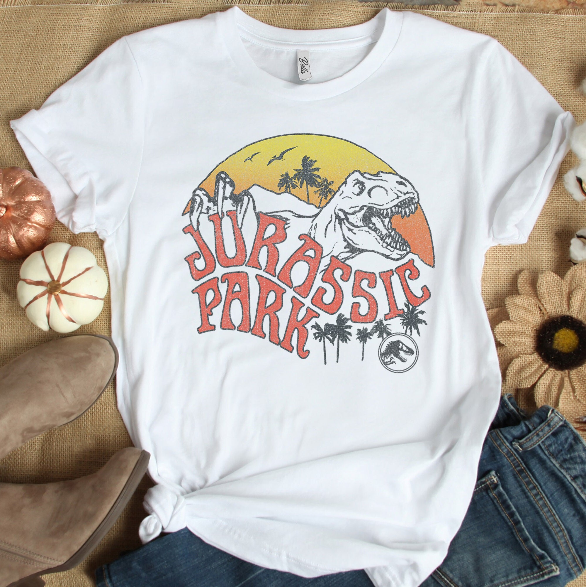 Discover Jurassic Park Retro T-Rex Sunset Logo Graphic T-shirt, Universal Orlando Trip  T-shirt