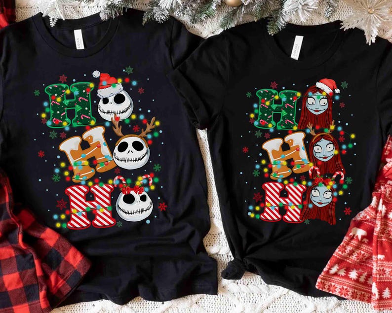 May include: Two black t-shirts with a festive Christmas design. One shirt features Jack Skellington and the other Sally from The Nightmare Before Christmas, with the words "HO HO HO" in a colorful, holiday-themed font.