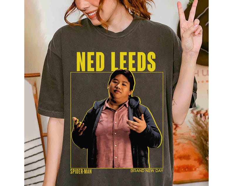 May include: A set of three ceramic canisters with lids, featuring a speckled white glaze and a minimalist design. The canisters vary in size, suitable for kitchen storage. The largest canister measures approximately 8 inches in height.