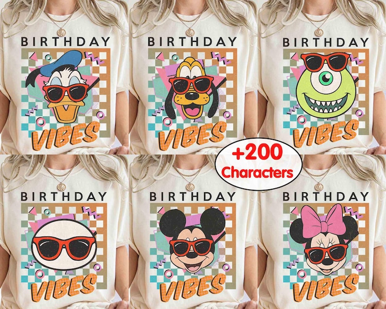 May include: Cream-coloured t-shirts with cartoon characters wearing sunglasses. Each shirt displays "BIRTHDAY" above the character and "VIBES" below. Characters include Donald Duck, Pluto, Mike Wazowski, a white circle, Mickey Mouse, and Minnie Mouse.