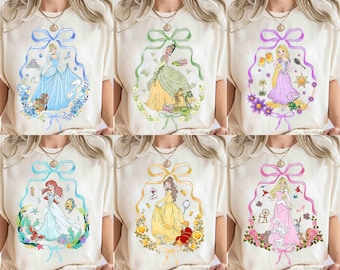 Camiseta de personajes de princesas Disney con lazos Coquette, camiseta de Tiana, Ariel, Elsa, Rapunzel, Bella y Jasmine, viaje familiar de chicas a WDW Magic Kingdom 2026