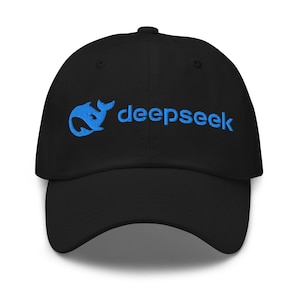 May include: Black baseball cap with a blue whale logo and the text "deepseek" embroidered on the front.