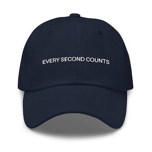 May include: A navy blue baseball cap with white embroidered text that reads "EVERY SECOND COUNTS".
