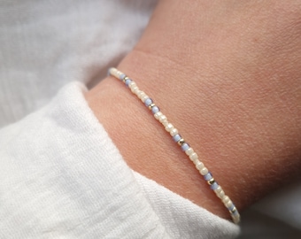 Delicate pearl bracelet | Filigree | beige, light blue, gold