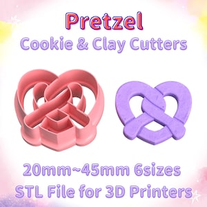 Puede incluir: Dos cortadores de galletas de plástico rosa y morado con forma de pretzel. Los cortadores tienen un tamaño de 20 mm a 45 mm y vienen en 6 tamaños. El texto "Pretzel Cookie & Clay Cutters" y "STL File for 3D Printers" es visible en la imagen.