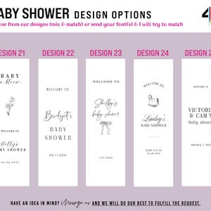 May include: A digital display showing five vertical baby shower sign design options labeled 21 through 25. Each white rectangular template features black text and line art illustrations, including floral, rocking horse, and ribbon motifs.