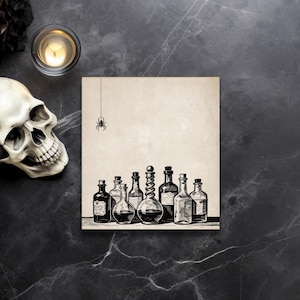 May include: A square print featuring a collection of vintage potion bottles in black and white. A spider hangs from a string above the bottles. A skull and candle are in the background, creating a spooky, Halloween theme.