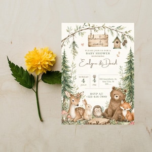 May include: A baby shower invitation with a woodland theme. The invitation features illustrations of a deer, rabbit, hedgehog, bear, and fox. The text reads "Adventure Awaits" and includes the names "Evelyne & David". A yellow flower is on the left.
