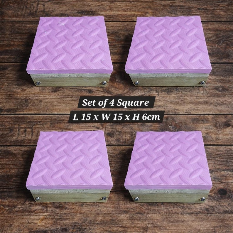May include: Set of four square blocks. Each block has a light purple, diamond-patterned top, a wooden base, and metal hardware. The text on the image reads: Set of 4 Square, L 15 x W 15 x H 6cm.