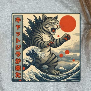 Catzilla Graphic Tee Shirt Design Monster Cat Godzilla Parody Japanese Style Anime Inspired Quirky Kaiju Funny Illustration Unisex Apparel