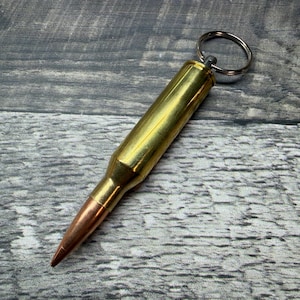 Chaveiro com bala .338 Norma Magnum