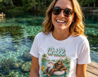 Chill Sasquatch with Rubber Duck on Unicorn Float T-Shirt | Retro Duck Pool Vibes