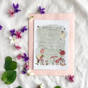 May include: A pink and green invitation card with a floral design and the text "Sparkle and swirl with the Birthday girl is turning". The card has blank lines for the date, time, location, RSVP, and by.