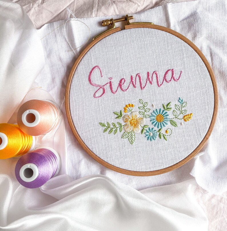 Floral nursery wall hanging embroidered with baby name fabric newborn announcement disc personalized heirloom gift image 4