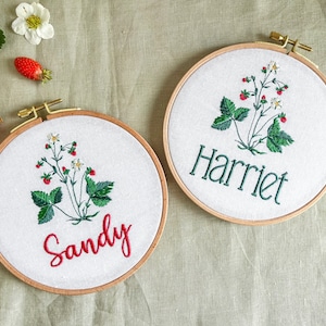 Woodland baby name wall hanging with strawberries, personalized cottagecore nursery decor, whimsical newborn gift, embroidered linen