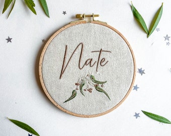 Baby name plaque embroidered with gumnuts and Australian natives, newborn birth announcement sign, gender neutral infant nursery decor