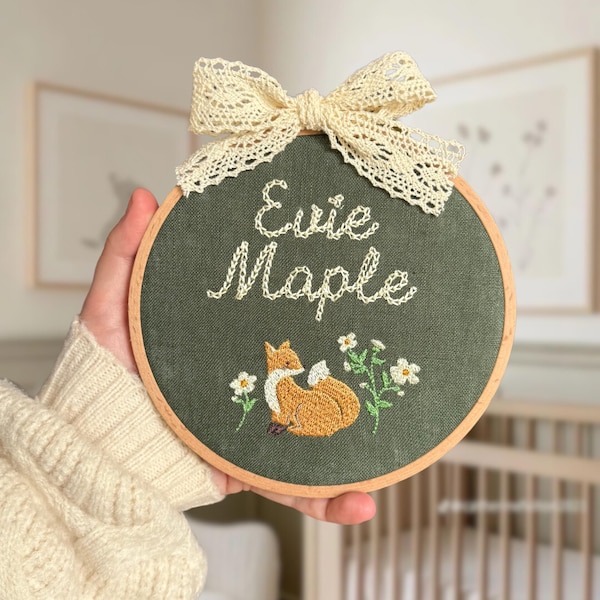 Embroidered plaque with baby’s name and a woodland fox amoungst flowers | baby name announcement sign and nursery wall decor