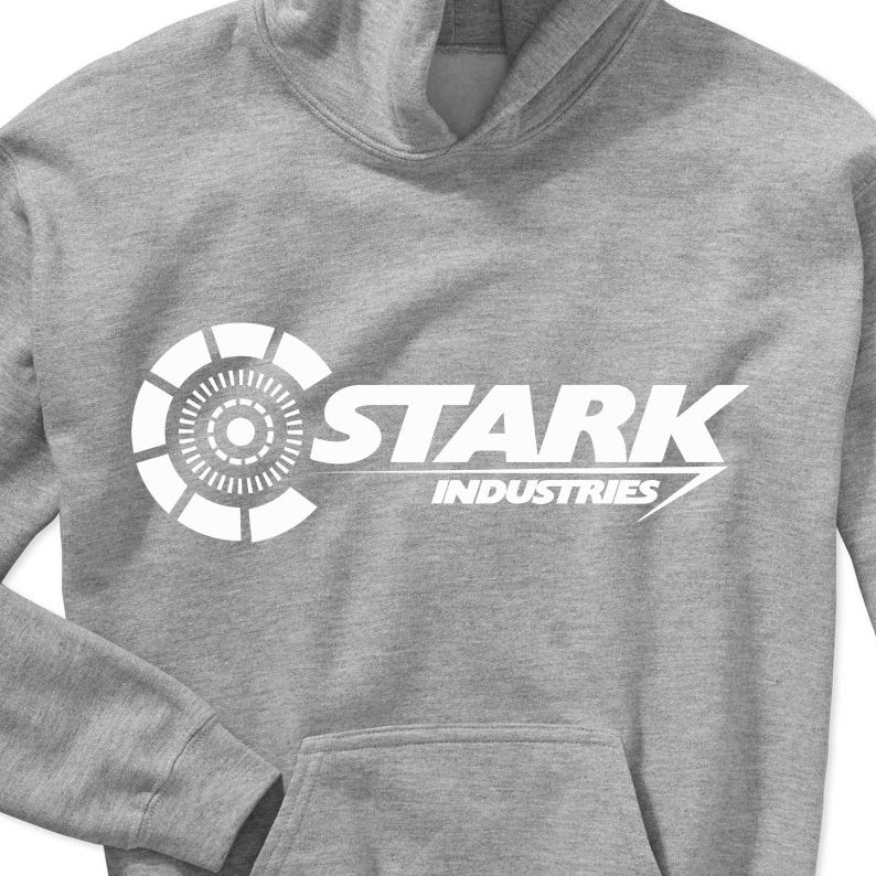 May include: A gray hoodie with a white graphic of the Stark Industries logo. The logo features a circular design with a smaller circle in the center and the text "STARK INDUSTRIES".