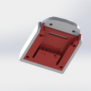 May include: A white and red plastic battery charger with a slot for a battery. The charger has a plus and minus sign on the side.