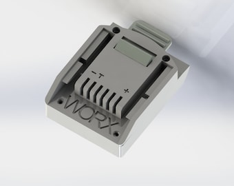May include: A gray plastic battery charger with the word "WORX" printed on the side. The charger has a slot for a battery and a button on the top.
