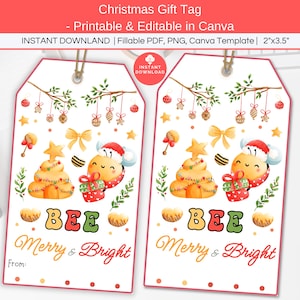 May include: Two Christmas gift tags with a festive design. Each tag features a watercolor illustration of a bee wearing a Santa hat, a Christmas tree, and the words "Merry & Bright". The tags are 2 inches by 3.5 inches.