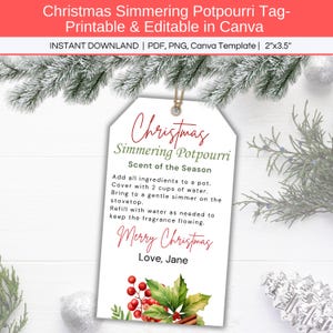 May include: A white printable tag with a Christmas theme. The tag has a red and green holly illustration with berries and cinnamon sticks. The text on the tag reads "Christmas Simmering Potpourri Scent of the Season" and includes instructions for making a simmering potpourri. The tag also says "Merry Christmas" and "Love, Jane".