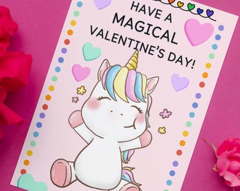 May include: A pink card with a unicorn illustration and the text "Have a magical Valentine's Day!" surrounded by colorful hearts and dots.