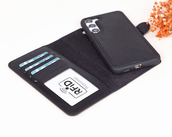 May include: Black leather phone case with a built-in wallet. The case has slots for cards and a window for ID. The case also has RFID protection.