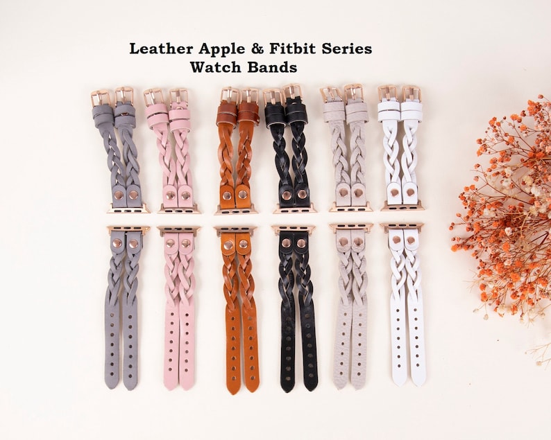 Peut inclure: Assortiment de bracelets de montre en cuir tress&eacute; dans diff&eacute;rentes couleurs, notamment gris, rose, marron, noir et blanc. Les bracelets sont con&ccedil;us pour les montres intelligentes Apple et Fitbit.  Leather Apple & Fitbit Series Watch Bands.