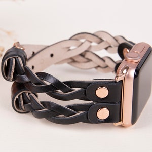 Peut inclure: Un bracelet de montre Apple en cuir noir tress&eacute; avec des d&eacute;tails en or rose. Le bracelet est double et pr&eacute;sente un design tiss&eacute;.