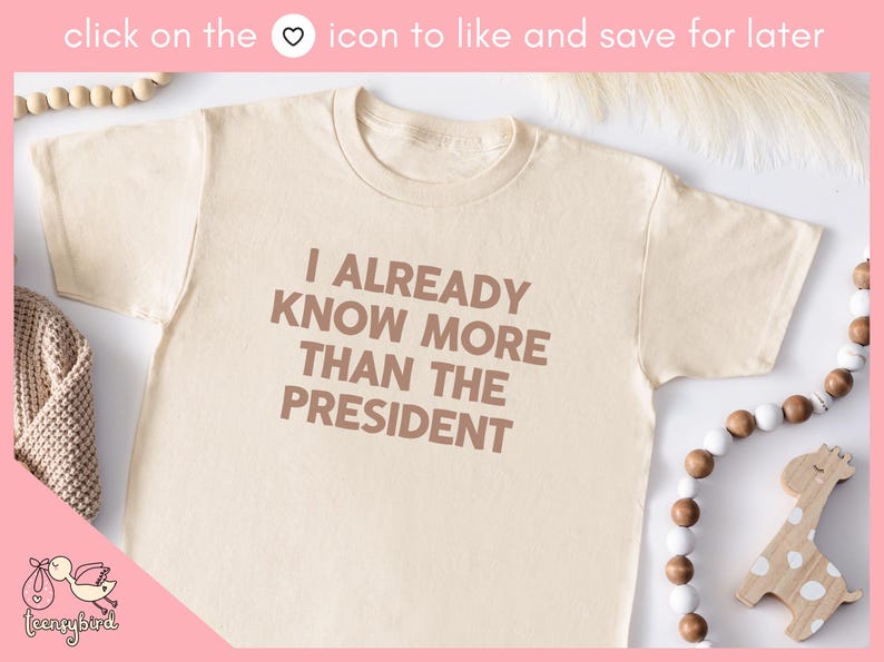 May include: A beige t-shirt with the text "I ALREADY KNOW MORE THAN THE PRESIDENT" printed in brown on the front.