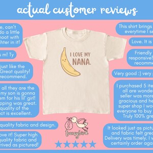 May include: Cream-colored t-shirt with a smiling banana graphic and the text "I LOVE MY NANA." The shirt is surrounded by customer reviews. The overall theme is children's apparel.