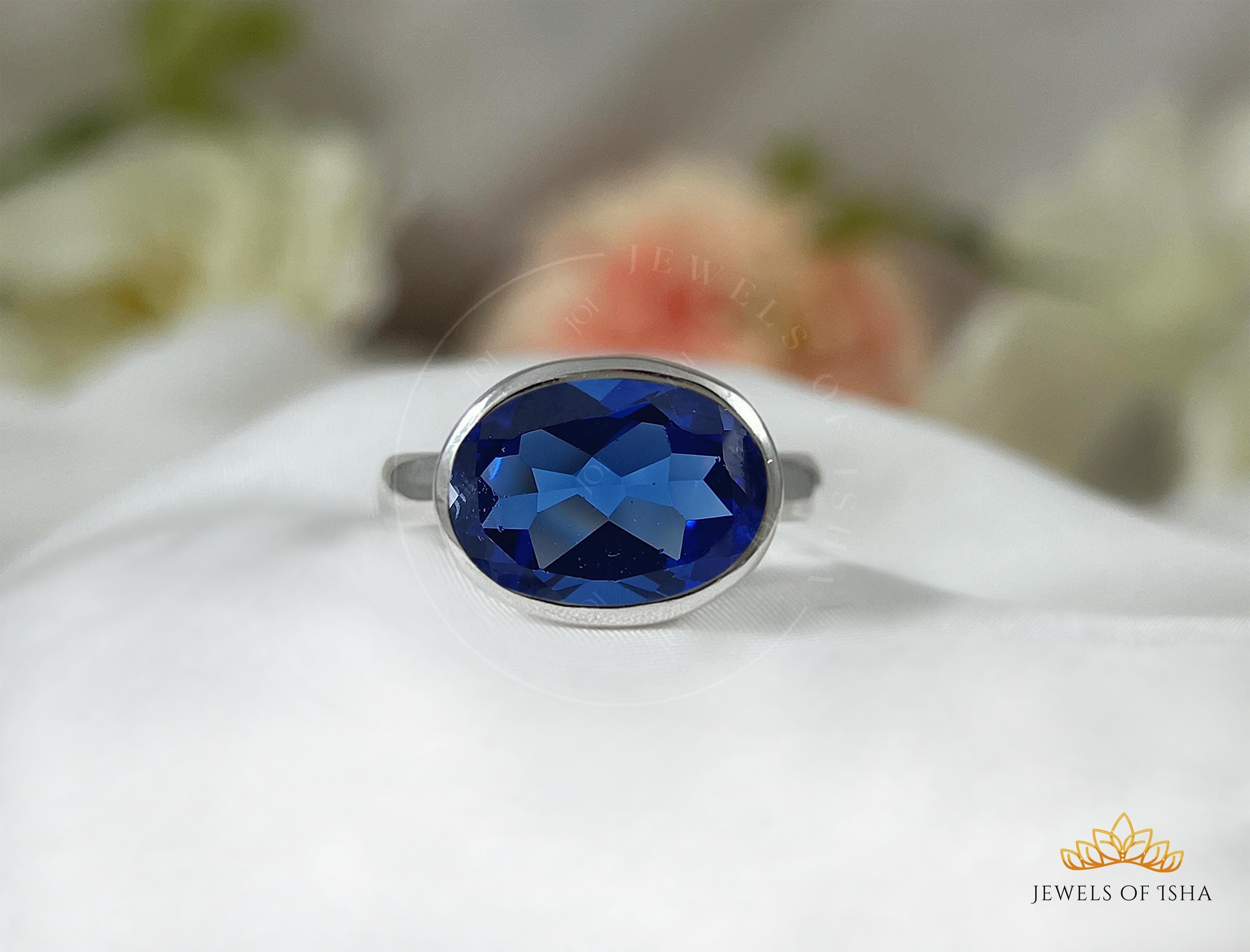 Bague en cuivre et saphir bleu facetté, fil enveloppé, fait main - France