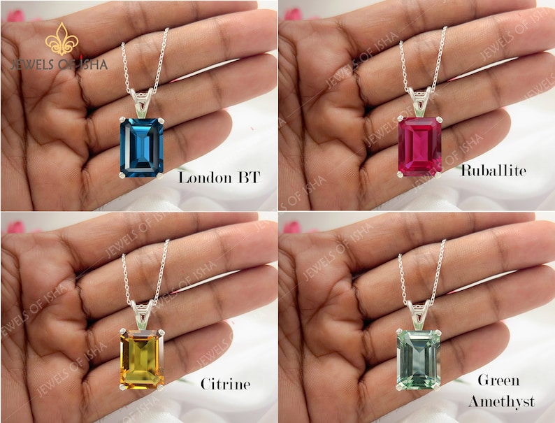 K&ouml;nnte beinhalten: Vier silberne Halsketten mit Smaragdschliff-Edelsteinen. Die Edelsteine sind London Blue Topaz, Rubellite, Citrin und gr&uuml;ner Amethyst.