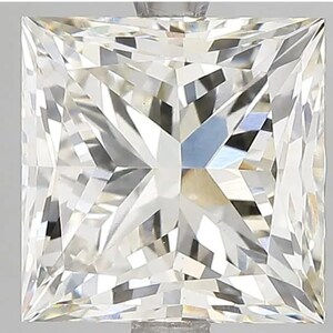 May include: A clear, square-shaped diamond with a brilliant cut. The diamond is set in a prong setting and has a high level of clarity.