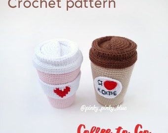 May include: Crochet pattern for a coffee to go cup. The cup is brown with a white lid and a red heart with the text "I love coffee" in Russian. The other cup is pink with a white lid and a red heart.