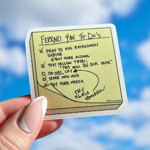 May include: A yellow sticky note with a to-do list for Ferrari fans. The list includes items such as "Pray to Kimi Raikkonen Shrine" and "Buy more alcohol". The note also includes the text "This will be our year" and "Try again tomorrow".