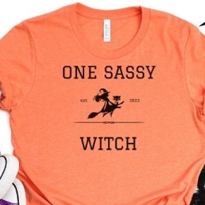 One Sassy Witch Graphic TShirt Halloween Shirt Halloween Fall Tee Womens Fall Shirt Retro Shirt Halloween Party Funny Mom Shirt Trendy Tee