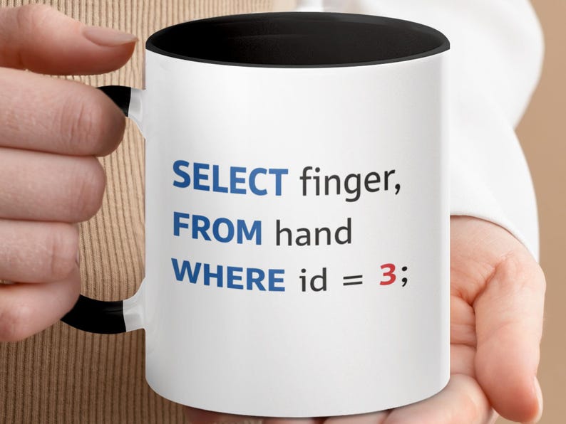Mug with blue text: SELECT finger, FROM hand WHERE id = 3;