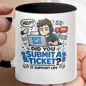 May include: White ceramic mug with a black interior and handle. The mug features a cartoon illustration of a person with a headset, laptop, and the text "DID YOU SUBMIT A TICKET? IT SUPPORT LIFE."