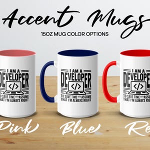 Three accent mugs with "Developer" text and computer icon, in pink, blue, and red.